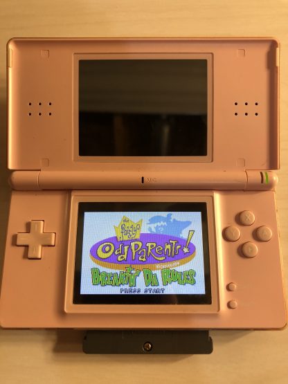 Nintendo DS Lite with Game Boy Advance game Fairly Odd Parents! Breakin' Da Rules